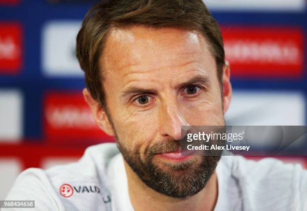 Gareth Southgate Manager of England speaks to the media during the England press conference at St Georges Park on June 6, 2018 in Burton-upon-Trent,...