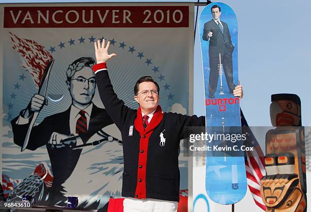 Comedian and talk show host Stephen Colbert reacts after receiving a custom made Burton snowboard from Olympic gold medalist Seth Westcott of the...