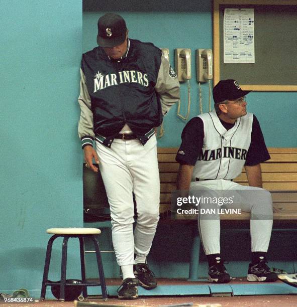 Seattle Mariner manager Lou Piniella stares at the ground after his relief pitcher Heathcliff Slocumb gave up two runs in the ninth inning to the...