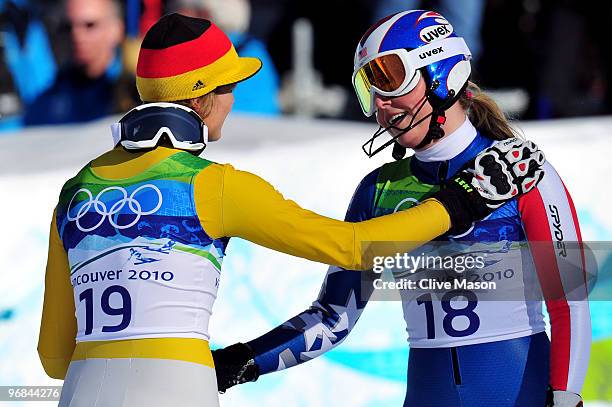 Maria Riesch of Germany speaks to Lindsey Vonn of The United States after the Alpine Skiing Ladies Super Combined Slalom on day 7 of the Vancouver...