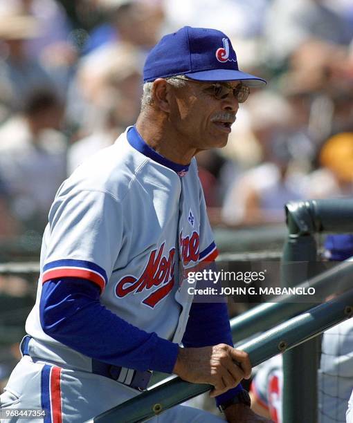 This 10 May 2001 file photo shows Montreal Expos manager Filipe Alou standing in the dugout during a game against the San Francisco Giants in San...