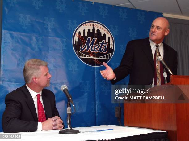 Art Howe gestures towards New York Mets General Manager Steve Phillips at a press conference 28 October, 2002 at Shea Stadium in Flushing, NY. Howe,...