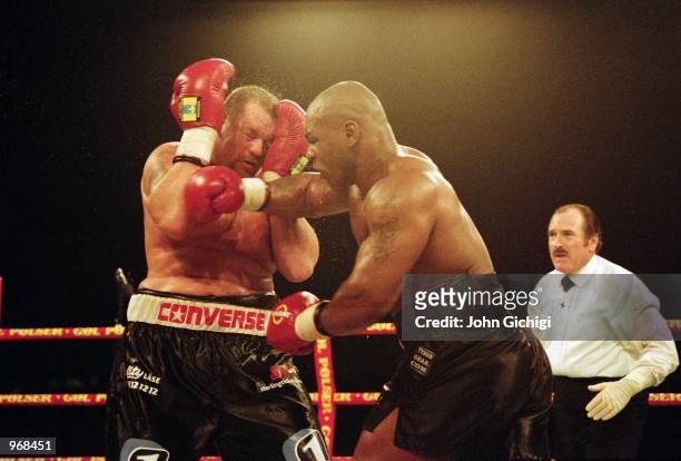 Mike Tyson of the USA on his way to defeating Brian Nielsen of Denmark during the World Heavyweight fight held at the Parken Stadion, in Copenhagen,...