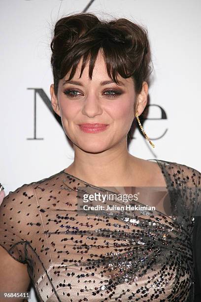 Marion Cotillard attends the premiere of 'Nine' at Cinema Gaumont Marignan on February 18, 2010 in Paris, France.