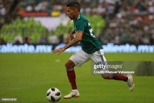 Javier Aquino of Mexico controls the ball during the International Friendly match between Mexico and Scotland at Estadio Azteca on June 2, 2018 in...
