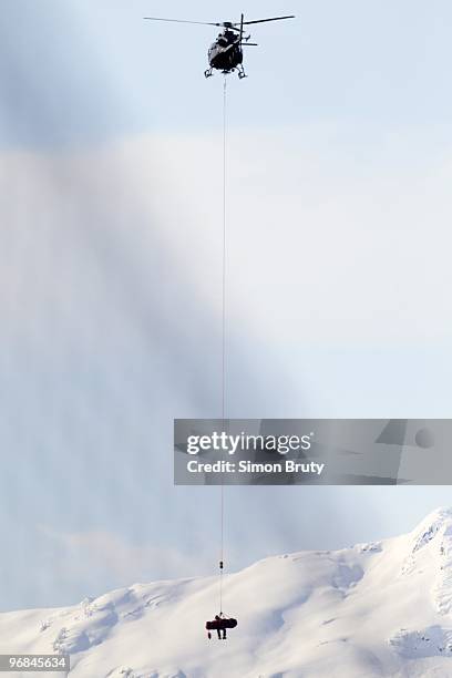 Winter Olympics: Romania Edith Miklos getting airlifted by helicopter after sustaining injury during Women's Downhill Final at Whistler Creekside....