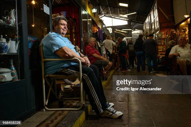 san telmo market, buenos aires - moving down to seated position stock pictures, royalty-free photos & images