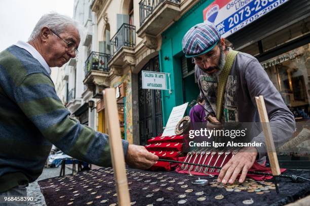 craftsman in san telmo, buenos aires - buenos momentos stock pictures, royalty-free photos & images