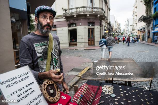 craftsman in san telmo, buenos aires - buenos momentos stock pictures, royalty-free photos & images