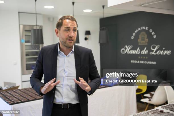 The CEO of H8 Collection, Jean-Philippe Cartier is photographed for Paris Match at the cooking school L'Art des Mets in his hotel domain Les Hauts de...