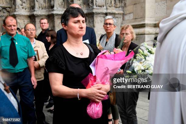 Mother of murdered French au-pair Sophie Lionnet, Catherine Devallonne leaves the church followed by Sophie's father Patrick Lionnet , after Sophie's...