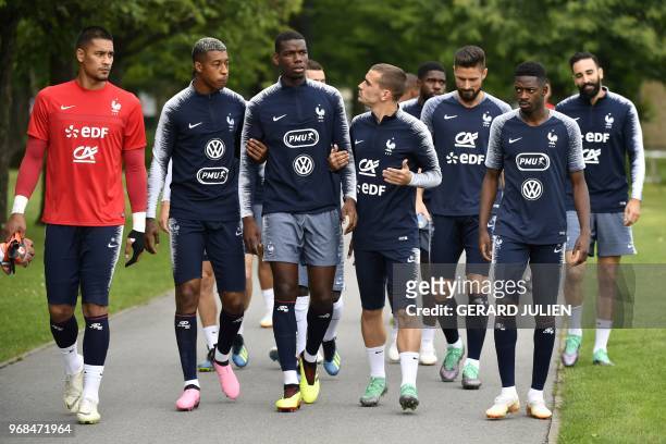 France's goalkeeper Alphonse Areola, defender Presnel Kimpembe, midfielder Paul Pogba, foward Antoine Griezmann, foward Olivier Giroud, foward...