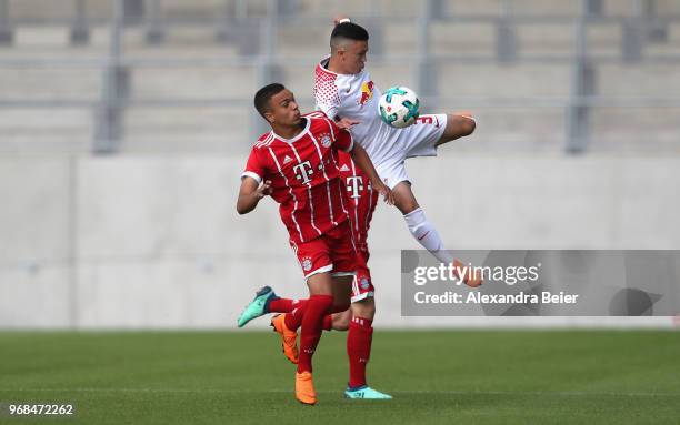 Oliver Batista Meier of FC Bayern Muenchen U17 fights for the ball with Oliver Bias of RB Leipzig U17 during the B Juniors German championship semi...