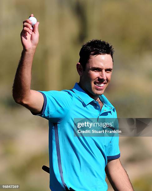 Charl Schwartzel of South Africa celebrates his win on the 16th hole during round two of the Accenture Match Play Championship at the Ritz-Carlton...