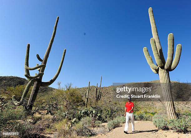 Ryo Ishikawa of Japan walks between holes during round two of the Accenture Match Play Championship at the Ritz-Carlton Golf Club on February 18,...