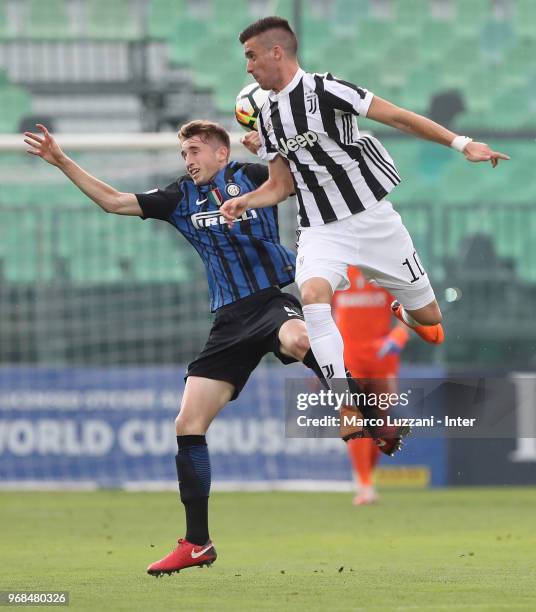 Ryan Patrick Nolan of FC Internazionale competes with Alessandro Tripaldelli of Juventus during the Serie A Primavera Playoff match between Juventus...