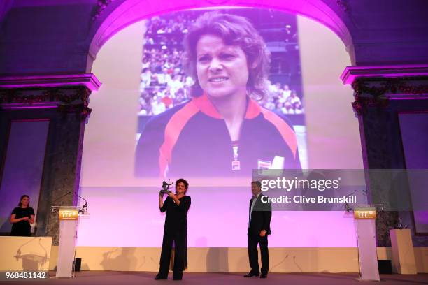 Evonne Goolagong Cawley collects the 2018 Philippe Chatrier award during the ITF World Champions Dinner following day ten of the 2018 French Open at...