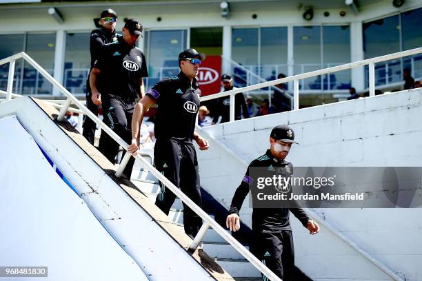 Rory Burns of Surrey leads his team out to open the Royal London One-Day Cup game between Surrey and Glamorgan at The Kia Oval on June 6, 2018 in...