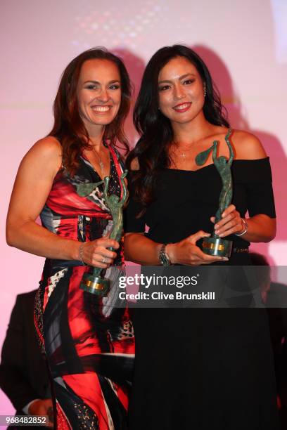 Womens doubles World Champions Latisha Chan and Martina Hingis collect their awards during the ITF World Champions Dinner following day ten of the...