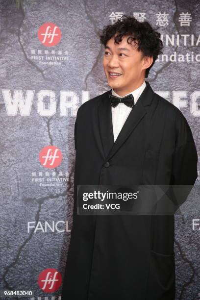 Singer Eason Chan Yick-shun attends First Initiative Foundation charity dinner on June 6, 2018 in Hong Kong, Hong Kong.