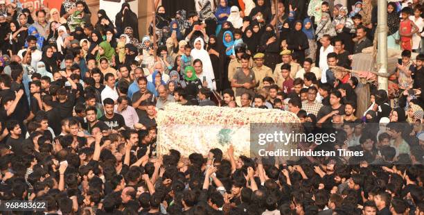 Massive procession is seen commemorating the martyrdom of Hazrat Imam Ali on 21st day of Ramzan in the old city area on June 6, 2018 in Lucknow,...