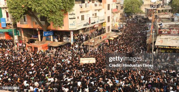 Massive procession is seen commemorating the martyrdom of Hazrat Imam Ali on 21st day of Ramzan in the old city area on June 6, 2018 in Lucknow,...