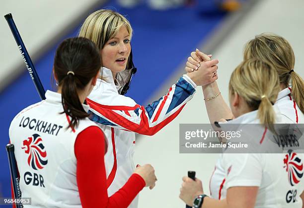 Skip Eve Muirhead of Great Britain congratulates teammates after defeating Russia during the women's curling round robin game on day 7 of the...