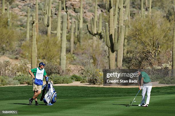 Luke Donald of England hits to the seventh green during the second round of the World Golf Championships-Accenture Match Play Championship at The...