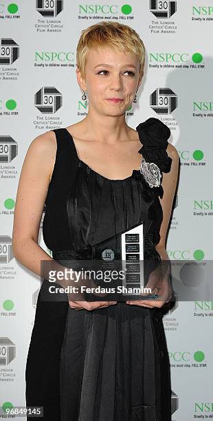 Carey Mulligan poses in the Winners Room at The London Critics' Circle Film Awards at The Landmark Hotel on February 18, 2010 in London, England.
