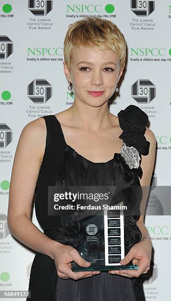 Carey Mulligan poses in the Winners Room at The London Critics' Circle Film Awards at The Landmark Hotel on February 18, 2010 in London, England.