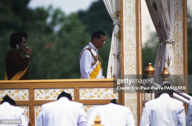 The King of Thailand and Queen Sirikit during the 50th anniversary ceremony of His Majesty's Accession to the Throne.