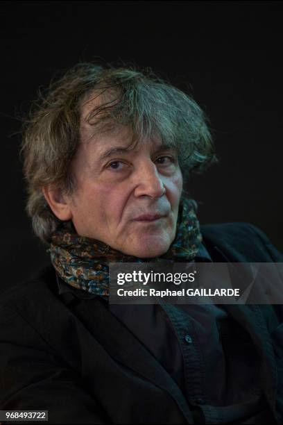 Portrait du poète, romancier, historien d?art et essayiste français Hubert Haddad pendant le 'Salon du Livre' le 21 mars 2014 à Paris, France.