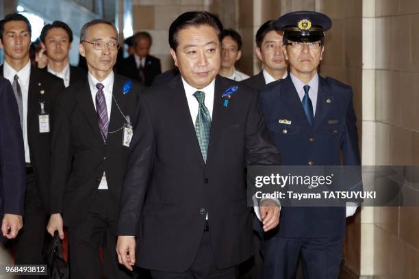 Japanese Prime Minister Yoshihiko Noda attends an upper house special committee meeting on July 19, 2012 on the comprehensive reforms of social...