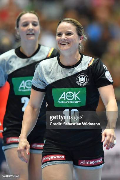 Anna Loerper of Germany smiles during the Women's handball International friendly match between Germany and Poland at Olympiahalle on June 6, 2018 in...