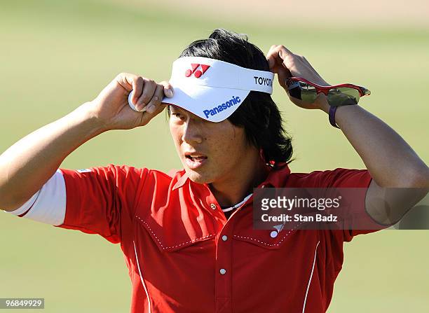 Ryo Ishikawa of Japan exits the 18th green during the second round of the World Golf Championships-Accenture Match Play Championship at The...