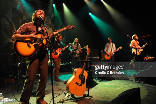 Tim Smith, Eric Nichelson, Paul Alexander, Unidentified and Eric Pulido of Midlake perform on stage at Shepherds Bush Empire on February 18, 2010 in...