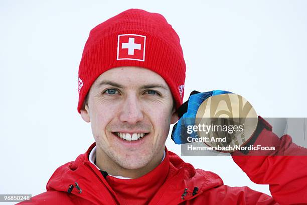 Simon Ammann of Switzerland smiles during a medal shooting at the Olympic Winter Games Vancouver 2010 ski jumping on February 13, 2010 in Whistler,...