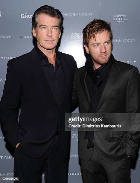 Actors Pierce Brosnan and Ewan McGregor attend the Cinema Society & Screevision screening of "The Ghost Writer" at the Crosby Street Hotel on...