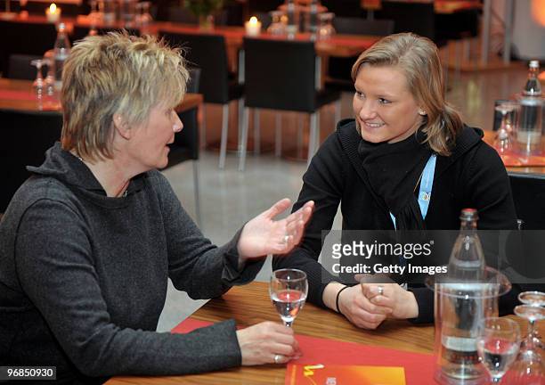 Tina Theune and Alexandra Popp are seen during an interview prior the FIFA Women's World Cup 2011 Countdown event at the Borussia Park Arena on...