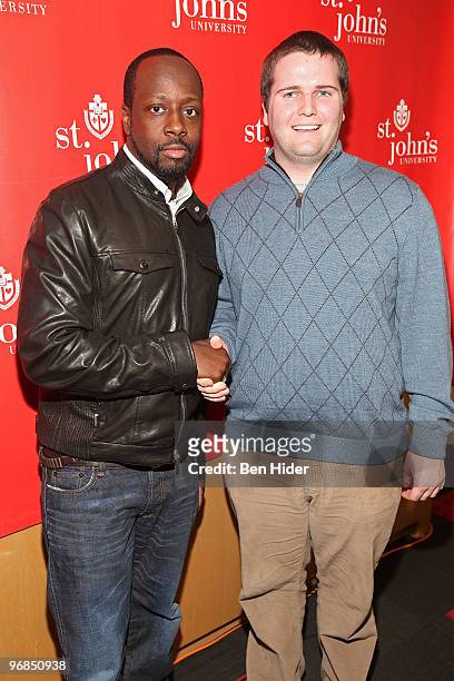 Musician Wyclef Jean and Student Government President Patrick McBurney promote the non-profit foundation Yele Haiti at St. John's University on...