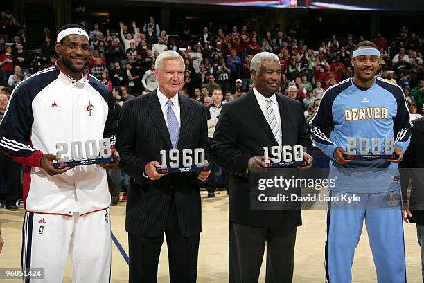 LeBron James of the Cleveland Cavaliers and Carmelo Anthony of the Denver Nuggets are honored alongside NBA greats Jerry West and Oscar Robertson for...