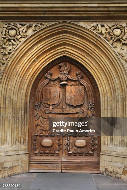 bath abbey west doors in bath,england - bath abbey stock pictures, royalty-free photos & images