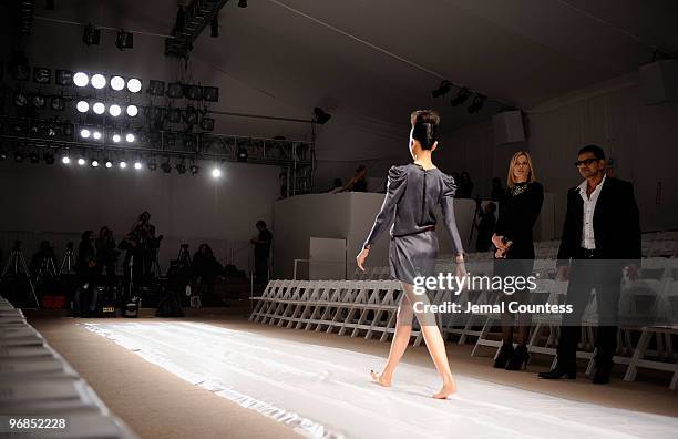 Designer Naeem Khan and Mary Alice Stephenson watch a dress rehearsel for the Naeem Khan Mercedes Benz 2010 Fall Fashion Show at Bryant Park on...