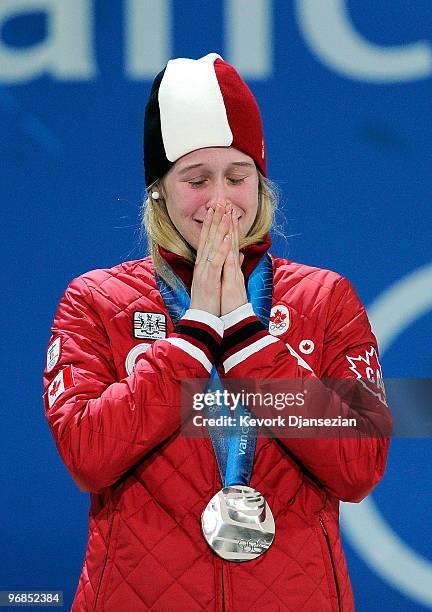 Marianne St-Gelais of Canada celebrates winning the silver medal during the medal ceremony for the Ladies' 500 m Short Track on day 7 of the...