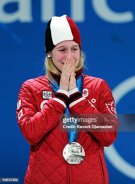 Marianne St-Gelais of Canada celebrates winning the silver medal during the medal ceremony for the Ladies' 500 m Short Track on day 7 of the...