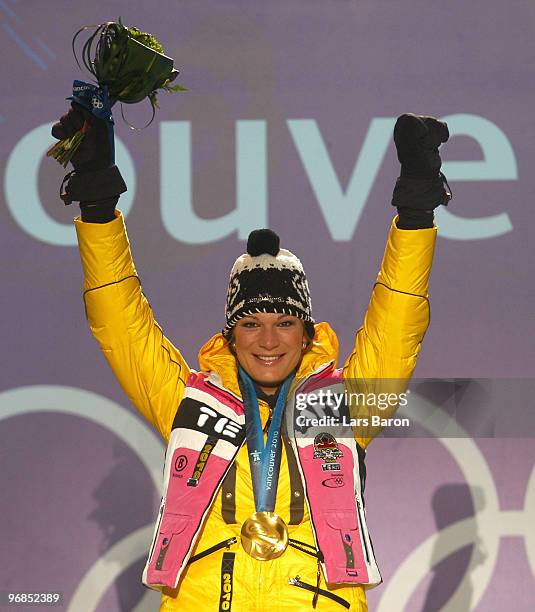 Maria Riesch of Germany celebrates winning the gold medal during the medal ceremony for the Ladies' Super Combined on day 7 of the Vancouver 2010...