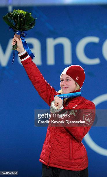 Marianne St-Gelais of Canada celebrates winning the silver medal during the medal ceremony for the Ladies' 500 m Short Track on day 7 of the...