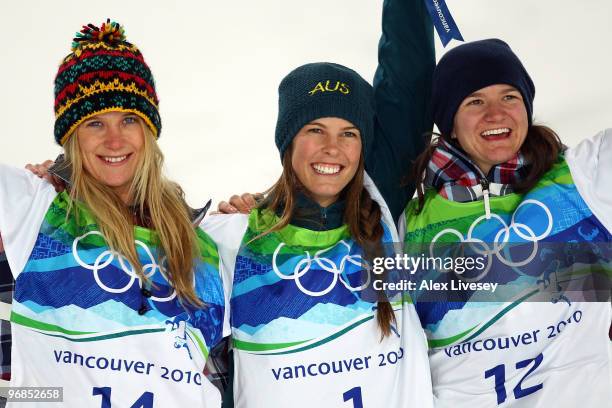 Hannah Teter of the United States celebrates winning the silver medal, Torah Bright of Australia gold and Kelly Clark of the United States bronze...