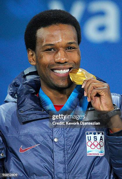 Shani Davis of United States celebrates winning the gold medal during the medal ceremony for the Men's 1000m Speed Skating on day 7 of the Vancouver...