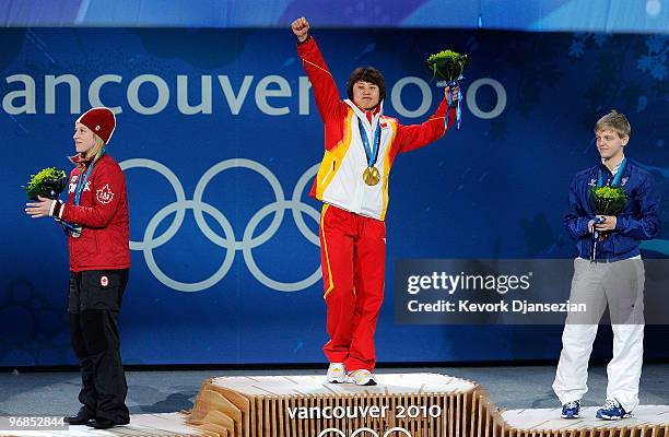 Marianne St-Gelais of Canada celebrates winning Silver, Wang Meng of China, Gold, and Arianna Fontana of Italy, Bronze during the medal ceremony for...